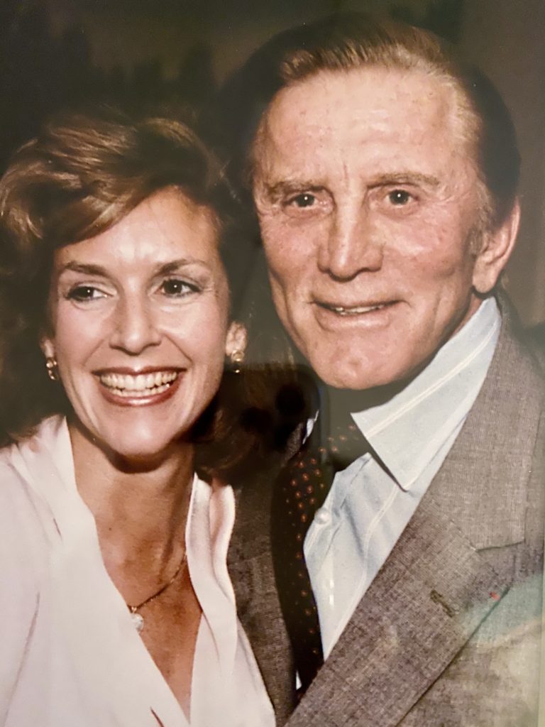 Karen shares a moment with legendary actor Kirk Douglas at the Motion Picture Assoc